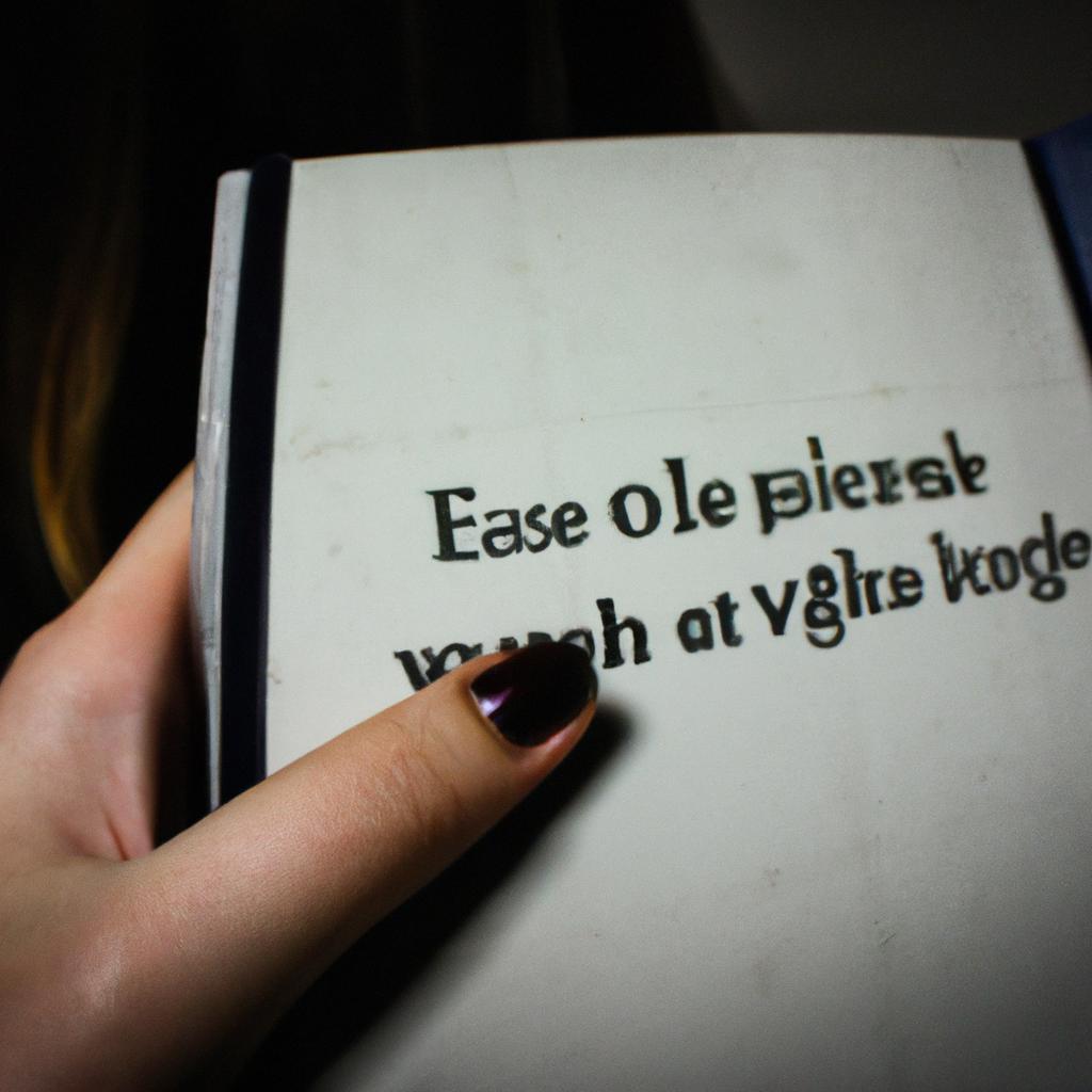 Person holding English phrase book