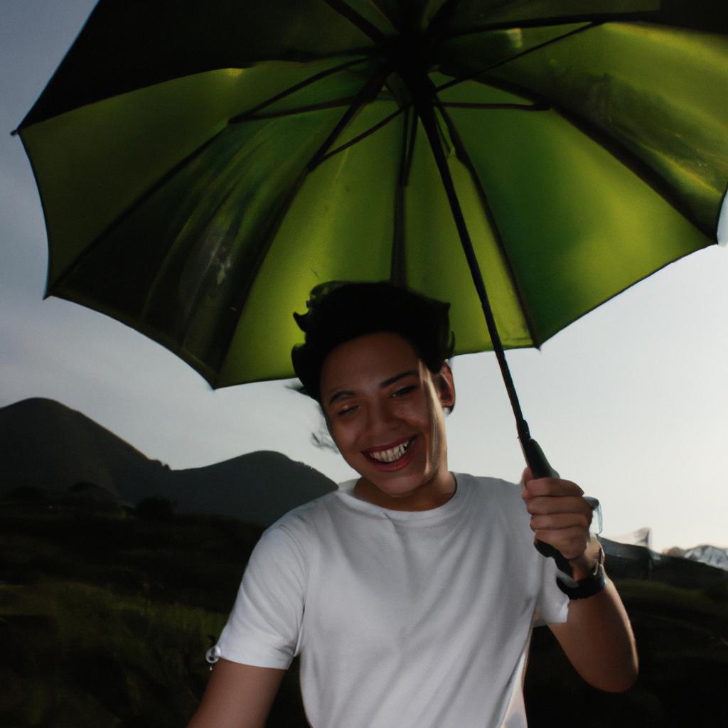 Person holding umbrella, smiling